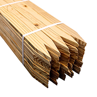 bundle of yellow pine wooden survey stakes